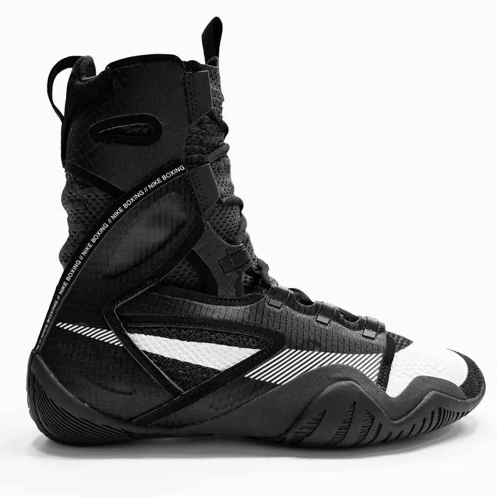 Nike Hyperko 2 boxing shoes in black and white featuring side profile, Flyknit knit upper, white Swoosh accent, and black support cage.