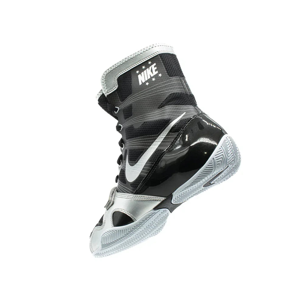 Three-quarter angle of Nike Hyperko 1 boxing shoe highlighting forefoot strap and ankle collar branding