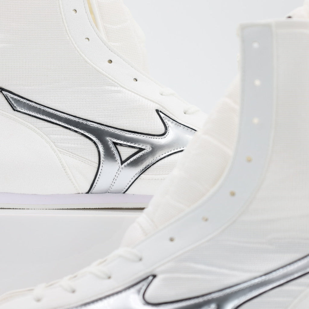 Mizuno High-Cut boxing boots white and silver, side profile showing lace height
