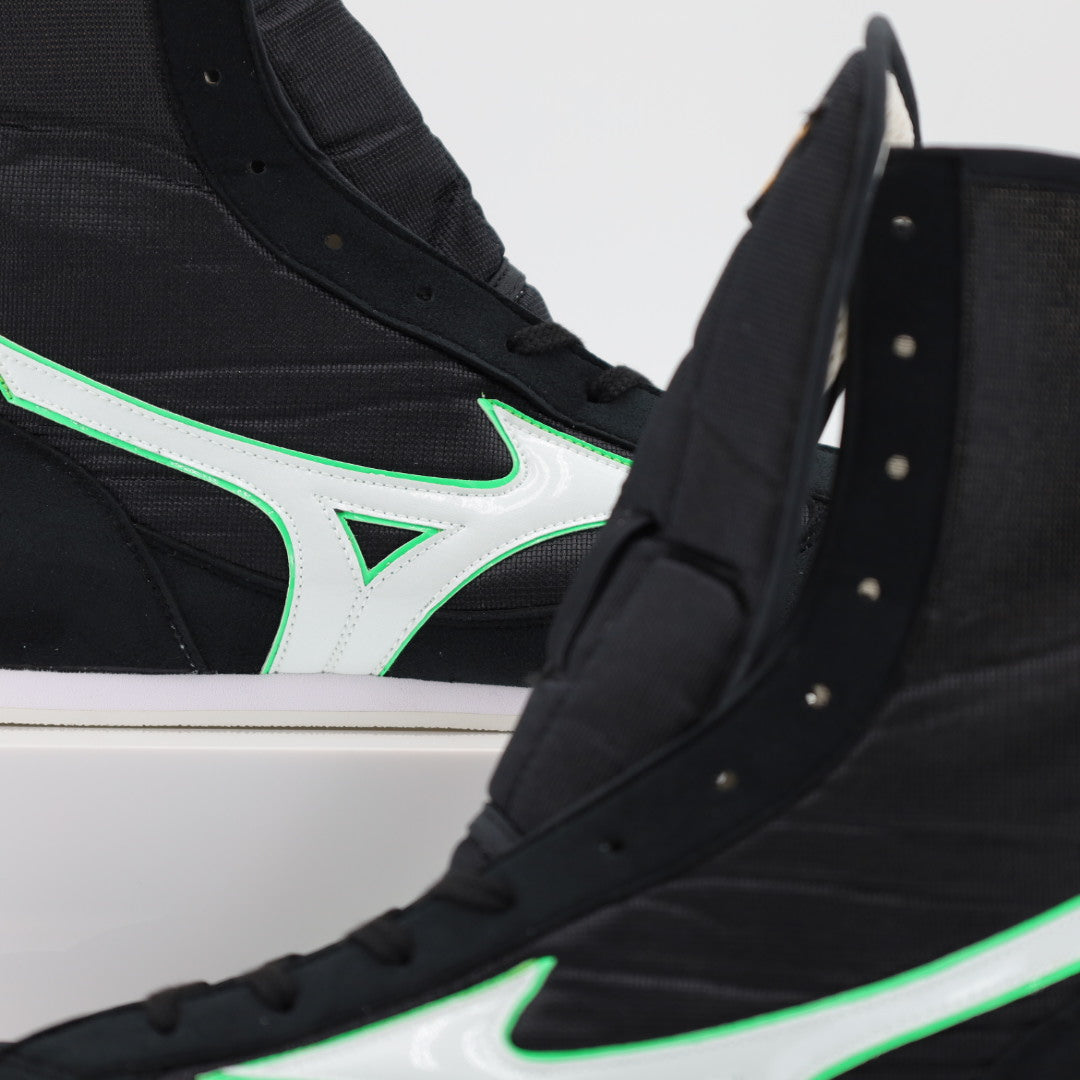 Mizuno High-Cut boxing boots black and green, side profile showing full boot height