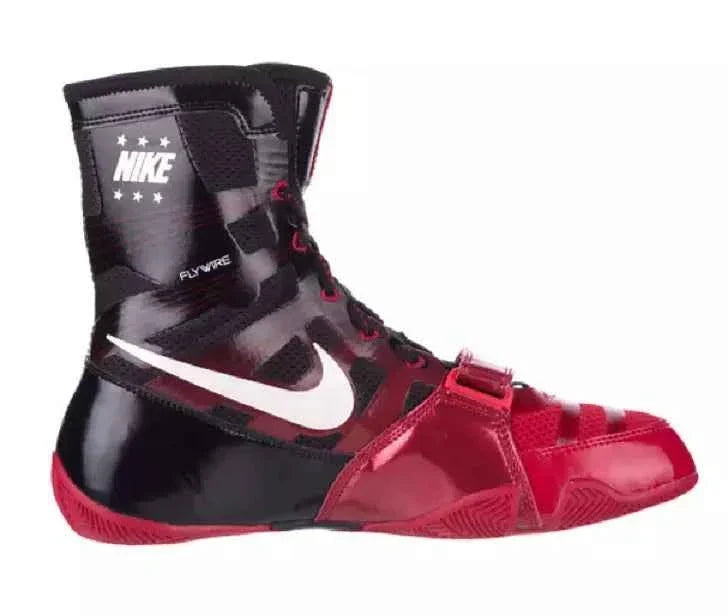 Side view of Nike Hyperko 1 black and red boxing boot displaying Flywire threads, black heel counter, and red midfoot strap