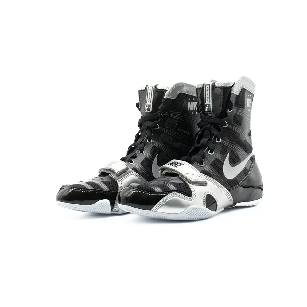Pair of Nike Hyperko 1 boxing shoes in black and metallic silver with midfoot straps and high-top collars