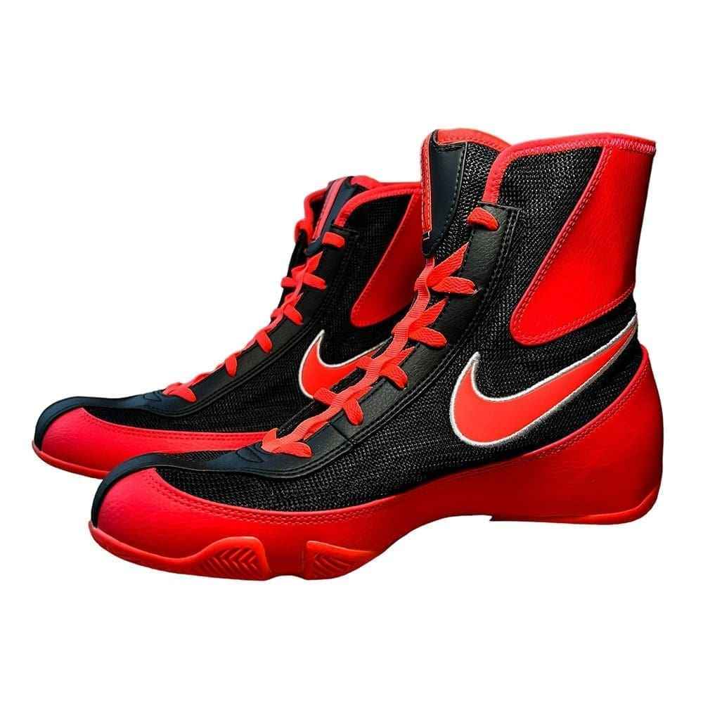 Rear heel perspective of pair of Nike Tawa combat shoes highlighting bright crimson heel counters and ankle support